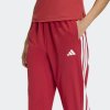 Dámské tepláky adidas WE 3S WOVEN PT - foto 4